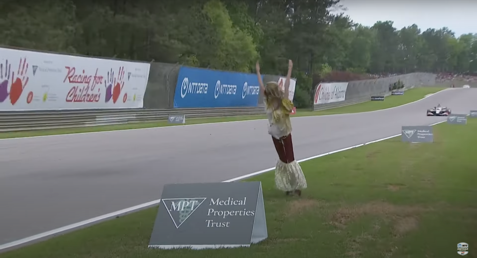 Mannequin falls onto the track during the Barber IndyCar race